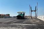 VIS Group starts laying asphalt concrete at the right-bank junction of the bridge over the Ob River in Novosibirsk
